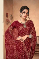 India Silk Maroon Chiffon Saree Features A Beautifully Attached Banarasi Border Combining The Softness And Flow Of Chiffon
